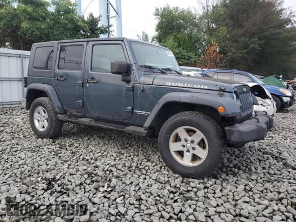 2007 Jeep Wrangler Unlimited Rubicon with VIN 1J8GA69167L145281, listed as a Copart auction lot 68919235 with 148,839 mi miles and Clean title. Bid and sale history available at DreamBid. Image 4.