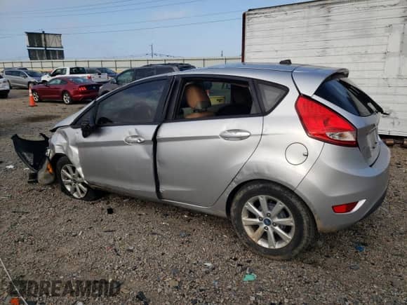 2011 Ford Fiesta SE with VIN 3FADP4EJ8BM111987, listed as a Copart auction lot 65947805 with 115,682 mi miles and Salvage title. Bid and sale history available at DreamBid. Image 2.