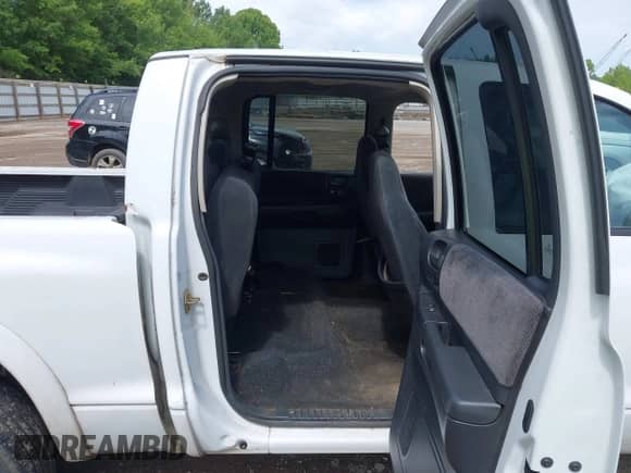 2002 Dodge Dakota with VIN 1B7HL38ZX2S625110, listed as a IAAI auction lot 42511915 with 262,217 mi miles and . Bid and sale history available at DreamBid. Image 8.