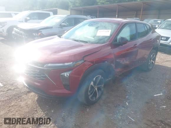 2024 Chevrolet Trax 1RS with VIN KL77LGE27RC173547, listed as a IAAI auction lot 42777228 with 29,858 mi miles and . Bid and sale history available at DreamBid. Image 2.