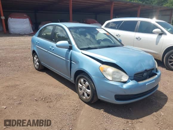 2006 Hyundai Accent GLS z VIN KMHCN46C96U056183, wystawiony jako IAAI lot #42937617 z przebiegiem 61 863 mil mil oraz . Historia ofert i sprzedaży dostępna na DreamBid. Obrazek 1.