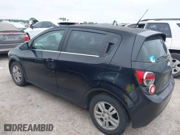 2014 Chevrolet Sonic LT with VIN 1G1JC6SB9E4234627, listed as a IAAI auction lot 42369440 with 63,098 mi miles and . Bid and sale history available at DreamBid. Image 3.