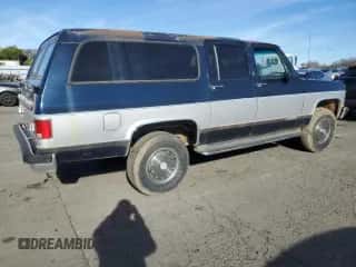 1991 Chevrolet Suburban с VIN 1GNGV26K1MF104219, выставлен на аукционе Copart как лот 87527045 с пробегом 189 345 миль миль и Чистый • Clean title. История ставок и продаж доступна на DreamBid. Изображение 3.