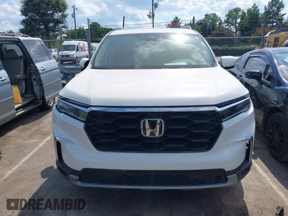 2025 Honda Pilot Elite z VIN 5FNYG1H83SB087315, wystawiony jako IAAI lot #43093587 z przebiegiem 8 682 mil mil oraz . Historia ofert i sprzedaży dostępna na DreamBid. Obrazek 12.