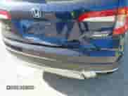 2020 Honda Pilot Elite с VIN 5FNYF6H02LB054348, выставлен на аукционе IAAI как лот 42302525 с пробегом 43 916 миль миль и . История ставок и продаж доступна на DreamBid. Изображение 6.