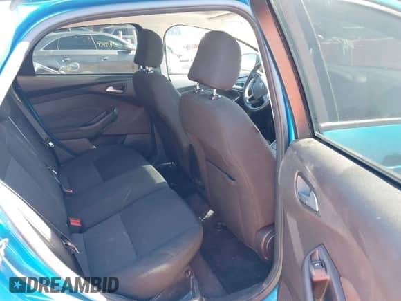 2015 Ford Focus SE with VIN 1FADP3K2XFL387103, listed as a IAAI auction lot 43525193 with 117,277 mi miles and . Bid and sale history available at DreamBid. Image 8.