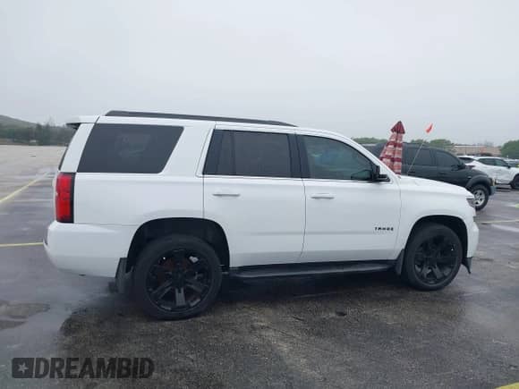 2019 Chevrolet Tahoe LS z VIN 1GNSCAKC1KR119209, wystawiony jako IAAI lot #41405837 z przebiegiem 102 300 mil mil oraz . Historia ofert i sprzedaży dostępna na DreamBid. Obrazek 13.
