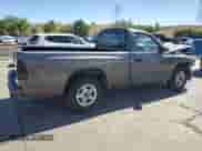 1999 Dodge Dakota SLT with VIN 1B7FL26X1XS161277, listed as a Copart auction lot 71794224 with 194,401 mi miles and Salvage title. Bid and sale history available at DreamBid. Image 3.
