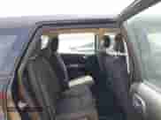 2012 Dodge Journey SE z VIN 3C4PDCAB5CT275973, wystawiony jako IAAI lot #42631803 z przebiegiem 120 440 mil mil oraz . Historia ofert i sprzedaży dostępna na DreamBid. Obrazek 8.