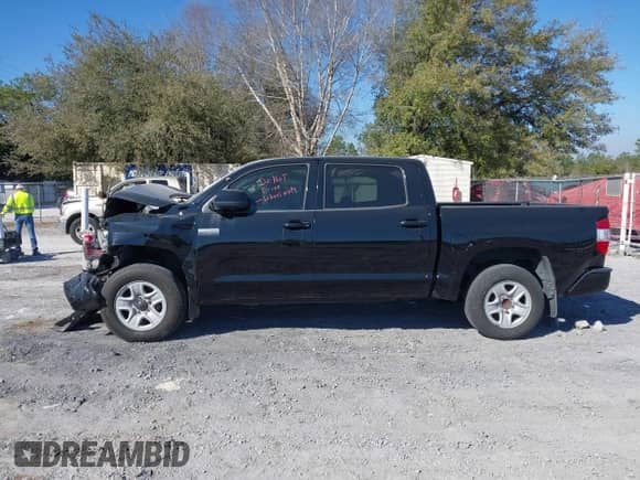 2017 Toyota Tundra Platinum with VIN 5TFAY5F10HX597924, listed as a IAAI auction lot 41169888 with 117,593 mi miles and . Bid and sale history available at DreamBid. Image 14.