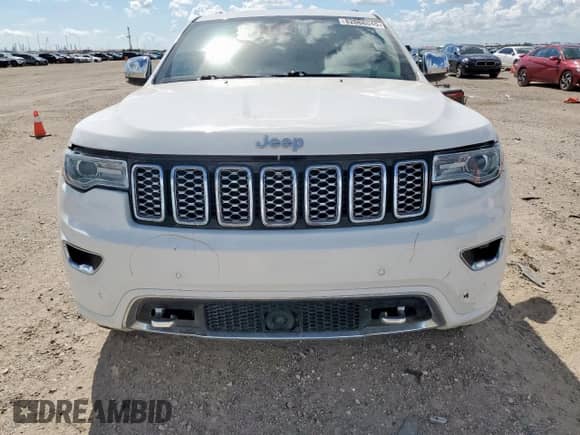 2017 Jeep Grand Cherokee Overland with VIN 1C4RJECG8HC965161, listed as a Copart auction lot 82068045 with 99,654 mi miles and Salvage title. Bid and sale history available at DreamBid. Image 5.