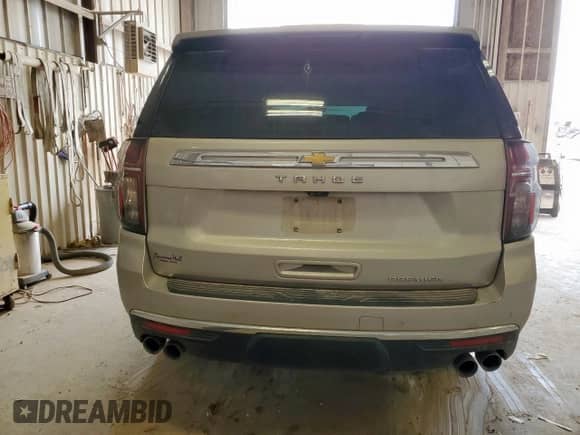 2021 Chevrolet Tahoe Premier with VIN 1GNSKSKD9MR213309, listed as a Copart auction lot 56747575 with 114,639 mi miles and Salvage title. Bid and sale history available at DreamBid. Image 6.