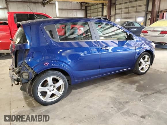 2014 Chevrolet Sonic LTZ с VIN 1G1JE6SB1E4111883, выставлен на аукционе Copart как лот 56010855 с пробегом 147 745 миль миль и Списание • Salvage title. История ставок и продаж доступна на DreamBid. Изображение 3.