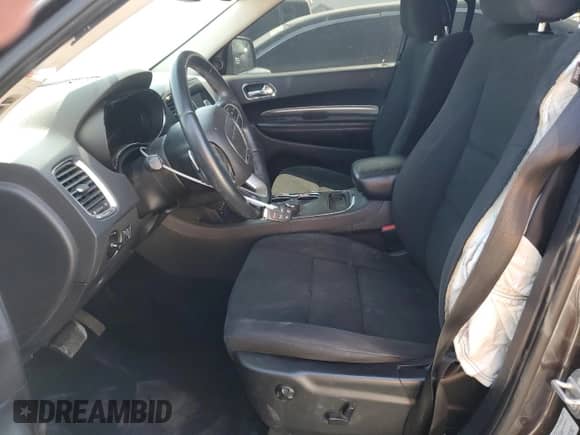 2015 Dodge Durango SXT with VIN 1C4RDHAG4FC938032, listed as a Copart auction lot 52642665 with 119,186 mi miles and Salvage title. Bid and sale history available at DreamBid. Image 7.