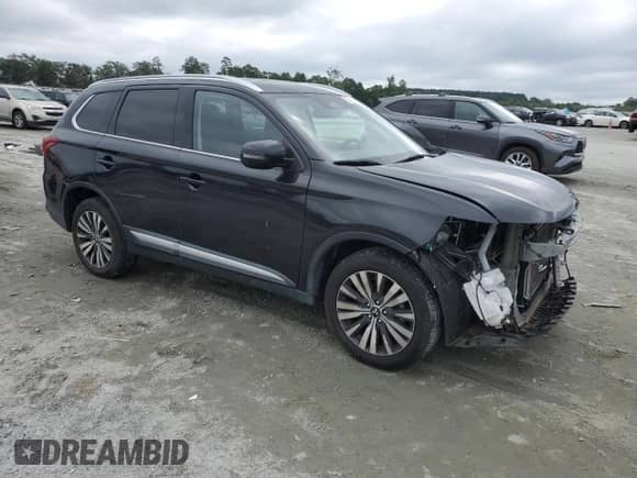 2020 Mitsubishi Outlander ES z VIN JA4AZ3A31LZ020921, wystawiony jako Copart lot #67187745 z przebiegiem 63 784 mil mil oraz Szkoda całkowita • Salvage title. Historia ofert i sprzedaży dostępna na DreamBid. Obrazek 4.