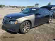 2014 Chrysler 300 S with VIN 2C3CCABG3EH357037, listed as a Copart auction lot 71667325 with 139,950 mi miles and Salvage title. Bid and sale history available at DreamBid. Image 1.