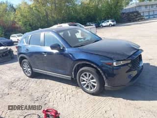 2023 Mazda CX-5 S Select z VIN JM3KFBBM7P0186107, wystawiony jako IAAI lot #43287081 z przebiegiem 126 778 mil mil oraz . Historia ofert i sprzedaży dostępna na DreamBid. Obrazek 1.