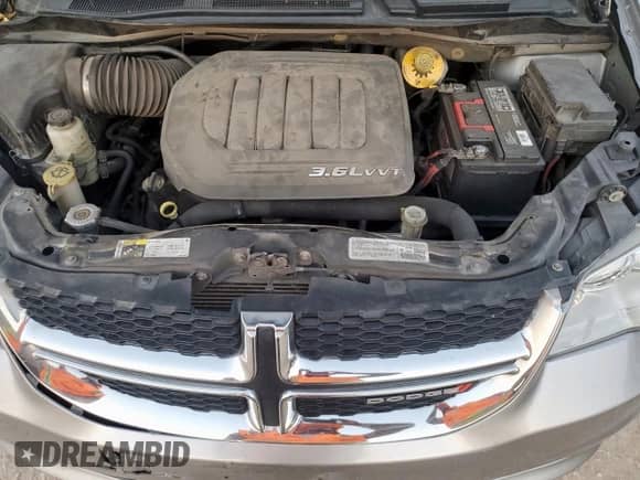 2014 Dodge Grand Caravan SXT with VIN 2C4RDGCG5ER477307, listed as a Copart auction lot 84047895 with 152,010 mi miles and Salvage title. Bid and sale history available at DreamBid. Image 12.