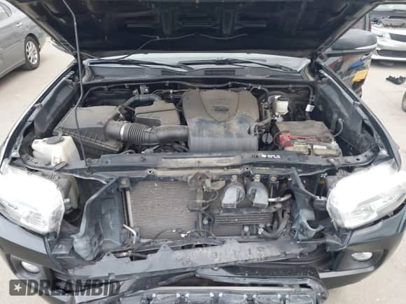 2016 Toyota Tacoma SR z VIN 5TFCZ5AN8GX002137, wystawiony jako IAAI lot #43262454 z przebiegiem 187 414 mil mil oraz . Historia ofert i sprzedaży dostępna na DreamBid. Obrazek 10.