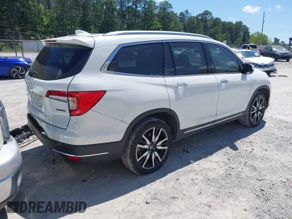 2021 Honda Pilot Touring 8-Passenger z VIN 5FNYF5H98MB037807, wystawiony jako IAAI lot #42136047 z przebiegiem 80 990 mil mil oraz . Historia ofert i sprzedaży dostępna na DreamBid. Obrazek 4.