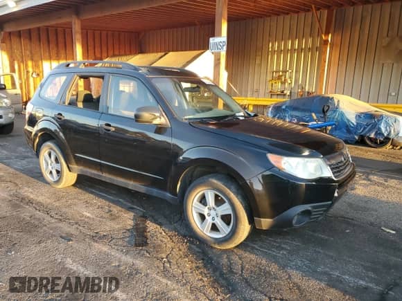 2010 Subaru Forester X with VIN JF2SH6BCXAH781531, listed as a Copart auction lot 82154365 with 154,536 mi miles and Salvage title. Bid and sale history available at DreamBid. Image 4.
