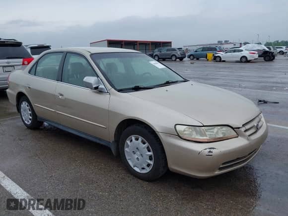 2002 Honda Accord LX with VIN JHMCG56402C025464, listed as a IAAI auction lot 42458693 with 257,711 mi miles and . Bid and sale history available at DreamBid. Image 1.