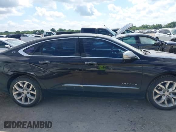 2017 Chevrolet Impala Premier with VIN 1G1145S3XHU189895, listed as a IAAI auction lot 42582713 with 100,179 mi miles and . Bid and sale history available at DreamBid. Image 13.