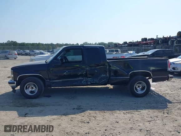 1998 Chevrolet Silverado 1500 z VIN 2GCEC19R7W1103854, wystawiony jako IAAI lot #43234033 z przebiegiem 276 944 mil mil oraz . Historia ofert i sprzedaży dostępna na DreamBid. Obrazek 14.