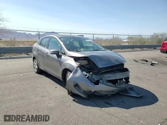 2014 Ford Fiesta SE с VIN 3FADP4BJ0EM117713, выставлен на аукционе Copart как лот 80512465 с пробегом 81 555 миль миль и Списание • Salvage title. История ставок и продаж доступна на DreamBid. Изображение 13.