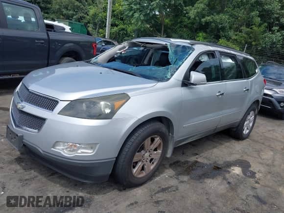 2011 Chevrolet Traverse 2LT with VIN 1GNKRJED2BJ219160, listed as a IAAI auction lot 42879587 with 158,404 mi miles and . Bid and sale history available at DreamBid. Image 2.