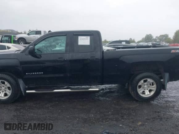 2014 Chevrolet Silverado 1500 LT with VIN 1GCVKREC5EZ407015, listed as a IAAI auction lot 43429255 with 42,489 mi miles and . Bid and sale history available at DreamBid. Image 14.