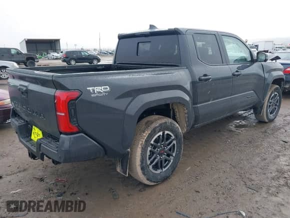 2024 Toyota Tacoma SR5 with VIN 3TMLB5JNXRM055645, listed as a IAAI auction lot 41208771 with 984 mi miles and . Bid and sale history available at DreamBid. Image 4.