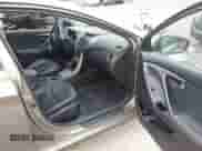 2013 Hyundai Elantra Limited z VIN 5NPDH4AEXDH415556, wystawiony jako IAAI lot #43161622 z przebiegiem 116 268 mil mil oraz . Historia ofert i sprzedaży dostępna na DreamBid. Obrazek 5.