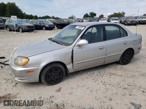 2005 Hyundai Accent GLS z VIN KMHCG45C25U603157, wystawiony jako Copart lot #71985824 z przebiegiem 110 124 mil mil oraz Czysty tytuł • Clean title. Historia ofert i sprzedaży dostępna na DreamBid. Obrazek 1.