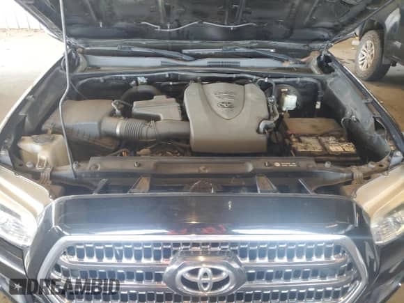 2016 Toyota Tacoma SR5 with VIN 3TMAZ5CN4GM003232, listed as a Copart auction lot 82364945 with 142,997 mi miles and Salvage title. Bid and sale history available at DreamBid. Image 11.