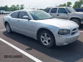 2010 Dodge Charger SXT with VIN 2B3CA3CV3AH290963, listed as a IAAI auction lot 42424676 with 295,661 mi miles and . Bid and sale history available at DreamBid. Image 1.