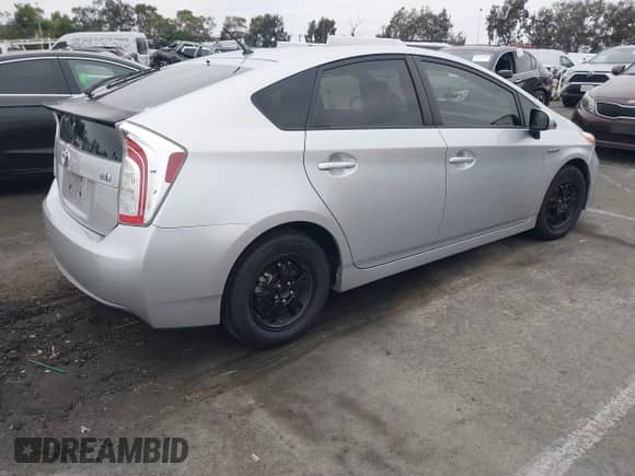 2015 Toyota Prius Two with VIN JTDKN3DU6F1937284, listed as a IAAI auction lot 43331218 with 215,757 mi miles and . Bid and sale history available at DreamBid. Image 4.