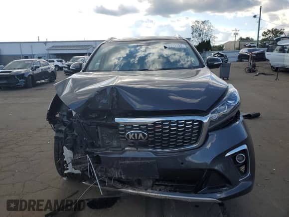 2019 Kia Sorento SX с VIN 5XYPKDA58KG447733, выставлен на аукционе Copart как лот 70173195 с пробегом 91 645 миль миль и Списание • Salvage title. История ставок и продаж доступна на DreamBid. Изображение 5.