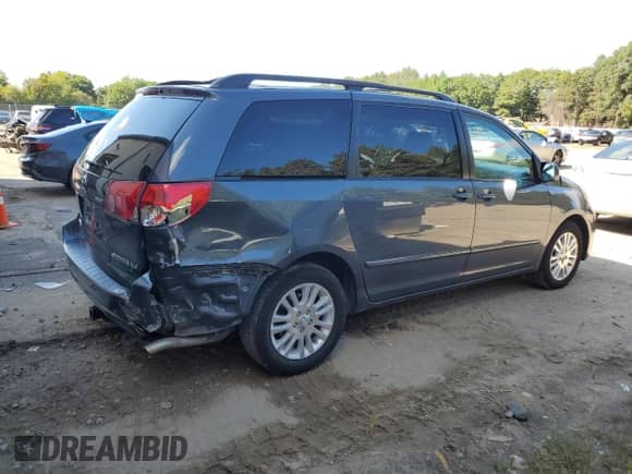 2010 Toyota Sienna XLE с VIN 5TDYK4CC6AS306693, выставлен на аукционе Copart как лот 80128555 с пробегом 198 791 миль миль и Списание • Salvage title. История ставок и продаж доступна на DreamBid. Изображение 3.