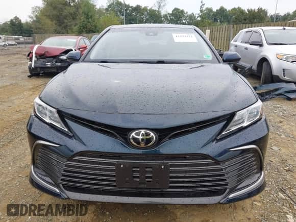 2021 Toyota Camry LE with VIN 4T1C11AK8MU548158, listed as a IAAI auction lot 43333222 with 34,824 mi miles and . Bid and sale history available at DreamBid. Image 13.