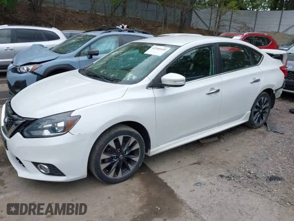2017 Nissan Sentra SR z VIN 3N1AB7AP6HY400863, wystawiony jako IAAI lot #42268449 z przebiegiem 60 331 mil mil oraz . Historia ofert i sprzedaży dostępna na DreamBid. Obrazek 2.
