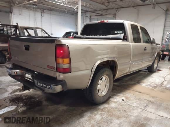 2003 GMC Sierra 1500 SLE with VIN 2GTEC19T731100301, listed as a IAAI auction lot 41336791 with 167,801 mi miles and . Bid and sale history available at DreamBid. Image 4.