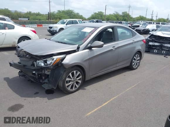 2017 Hyundai Accent Value Edition z VIN KMHCT4AE3HU355900, wystawiony jako IAAI lot #42121989 z przebiegiem Nie podano mil oraz . Historia ofert i sprzedaży dostępna na DreamBid. Obrazek 2.