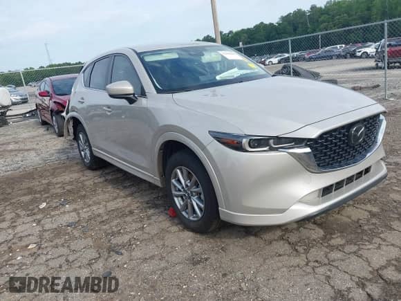 2025 Mazda CX-5 S Select z VIN JM3KFBBLXS0566588, wystawiony jako IAAI lot #42492886 z przebiegiem 15 382 mil mil oraz . Historia ofert i sprzedaży dostępna na DreamBid. Obrazek 1.