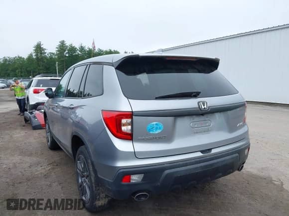 2019 Honda Passport EX-L with VIN 5FNYF8H54KB007201, listed as a IAAI auction lot 42502570 with 55,560 mi miles and . Bid and sale history available at DreamBid. Image 3.