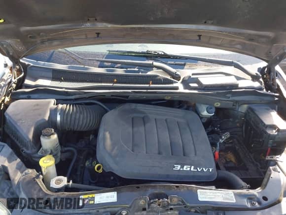 2015 Dodge Grand Caravan SXT z VIN 2C4RDGCG8FR584756, wystawiony jako IAAI lot #43345877 z przebiegiem Nie podano mil oraz . Historia ofert i sprzedaży dostępna na DreamBid. Obrazek 10.