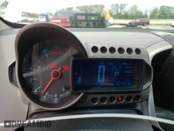 2014 Chevrolet Sonic LTZ с VIN 1G1JE6SB9E4130200, выставлен на аукционе Copart как лот 55669475 с пробегом 104 635 миль миль и Списание • Salvage title. История ставок и продаж доступна на DreamBid. Изображение 9.