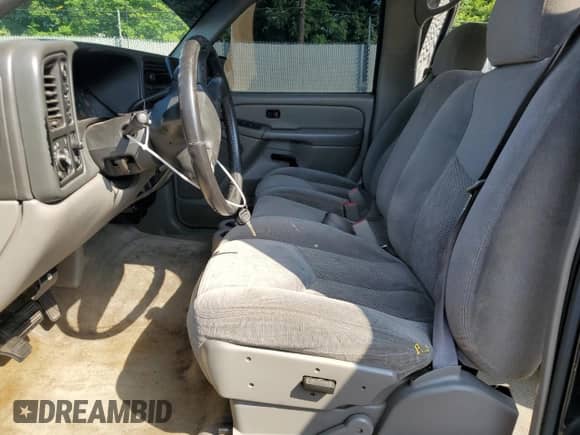 2005 Chevrolet Tahoe LS with VIN 1GNEK13V05J258475, listed as a Copart auction lot 56576945 with 221,577 mi miles and Salvage title. Bid and sale history available at DreamBid. Image 7.