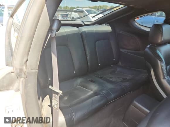 2004 Hyundai Tiburon GT с VIN KMHHN65F24U111292, выставлен на аукционе Copart как лот 69176925 с пробегом Не указан миль и Списание • Salvage title. История ставок и продаж доступна на DreamBid. Изображение 10.