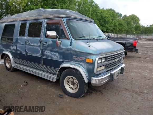1995 Chevrolet Chevy Van with VIN 1GBEG25K2SF232174, listed as a IAAI auction lot 42247426 with 130,910 mi miles and . Bid and sale history available at DreamBid. Image 1.